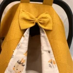 Funda para silla de coche de bebé en algodón waffle color mostaza con forro de popelina con motivo de ciervo, compatible con cochecito